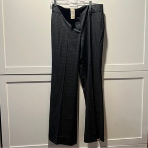 AT, size 8, gray with white lined details.